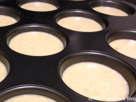 Batter in the mini cupcake pans for Dutch Babies